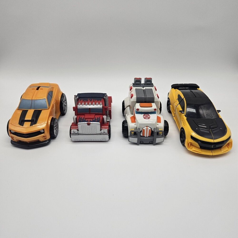 Hasbro Tomy Transformers Lot Of 4 Bumblebee Optimus Prime Rescue Bots